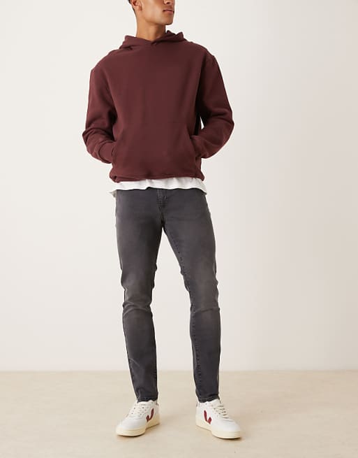 DESIGN skinny jeans in washed black