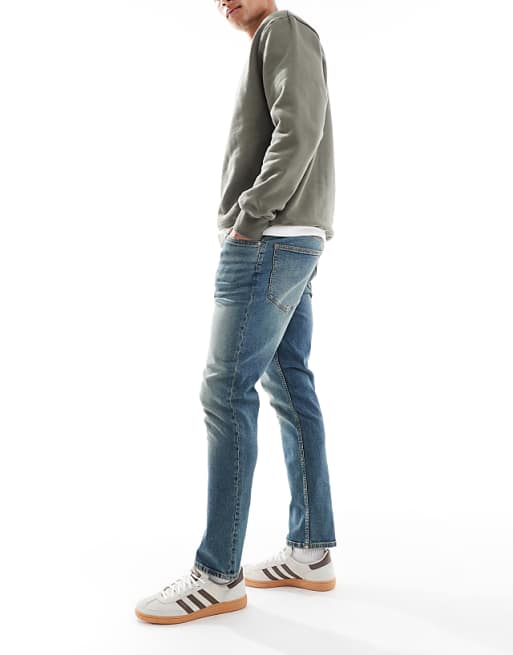 DESIGN Slim Jeans In Mid Wash Blue With Tint