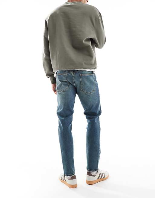 DESIGN Slim Jeans In Mid Wash Blue With Tint