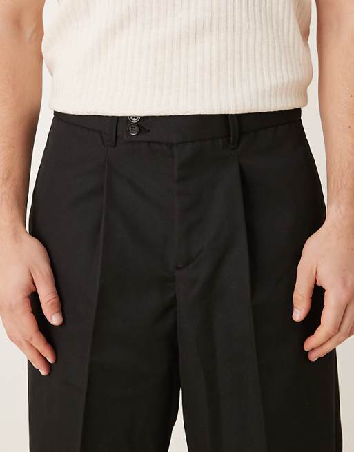DESIGN Smart Carrot Fit Trousers With Double Button Waistband In Black