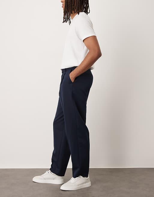 DESIGN smart oversized tapered trousers with front pleats in navy