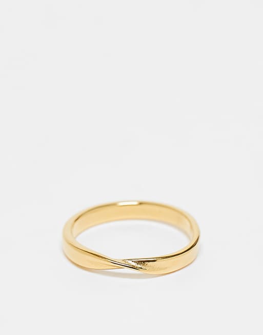 DESIGN stainless steel twist ring in gold tone