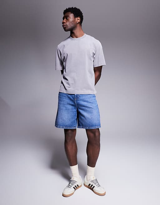 DESIGN standard length denim jort in mid wash blue