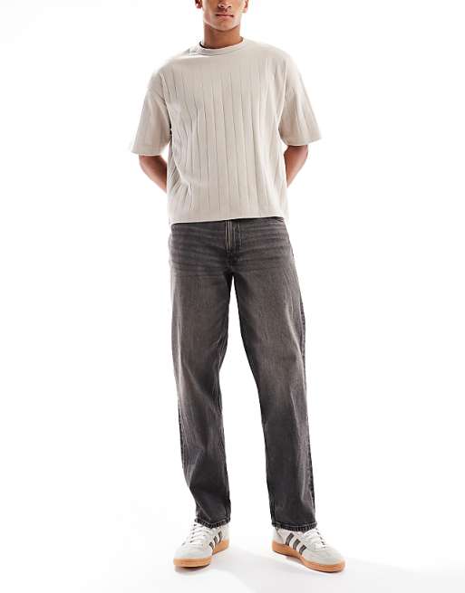 DESIGN straight fit jeans with yellow tint in washed black