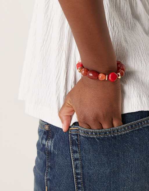 DESIGN stretch bracelet with beads in orange and red