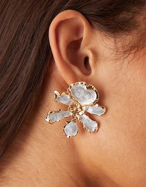 DESIGN stud earrings with blue floral design and gold tone details