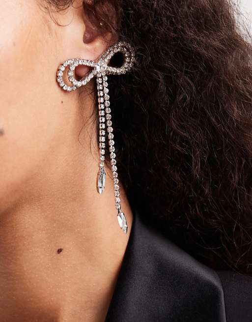 DESIGN stud earrings with diamante bow design in silver tone