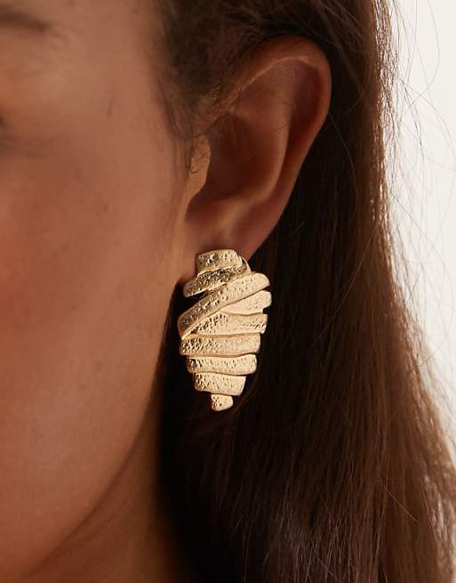 DESIGN studs earrings with layered ridged design in textured gold tone