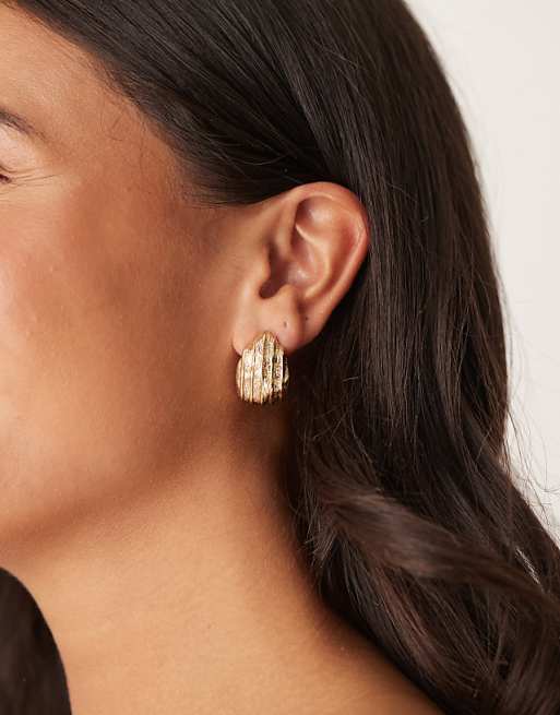 DESIGN studs earrings with textured teardrop design in gold tone
