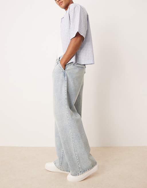 DESIGN Super Baggy Jeans With Front Pleats In Light Wash Blue