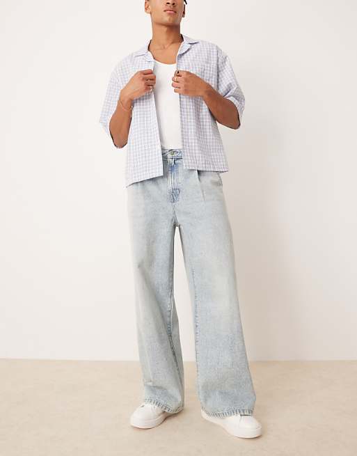 DESIGN super baggy jeans with front pleats in light wash blue