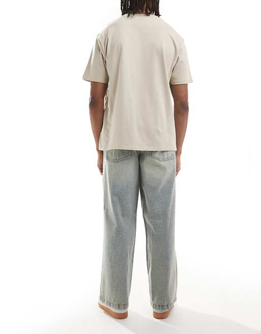 DESIGN Super Baggy Jeans With Side Panel In Yellow Tint Light Wash Blue