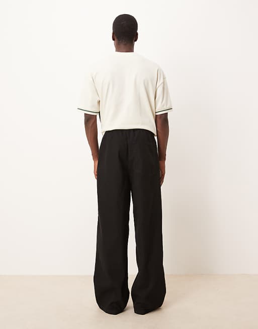 DESIGN Super Baggy Lightweight Jeans In Washed Black