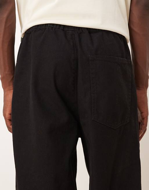 DESIGN Super Baggy Lightweight Jeans In Washed Black