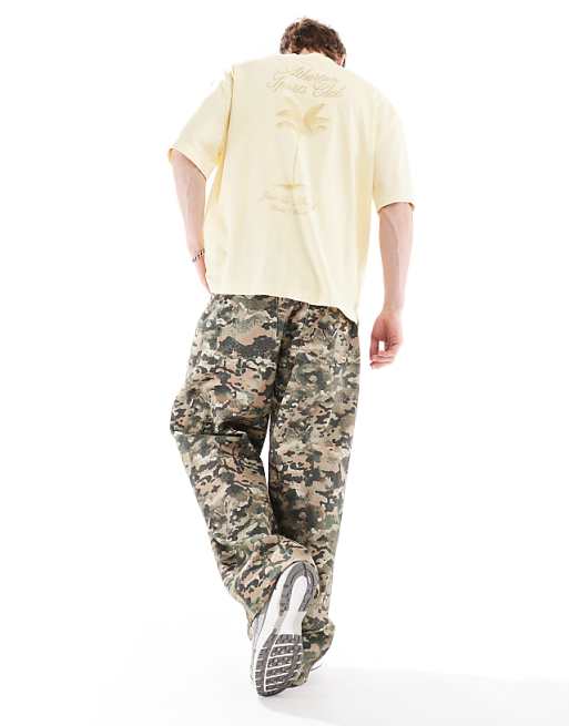 DESIGN Super Baggy Trousers In Camo