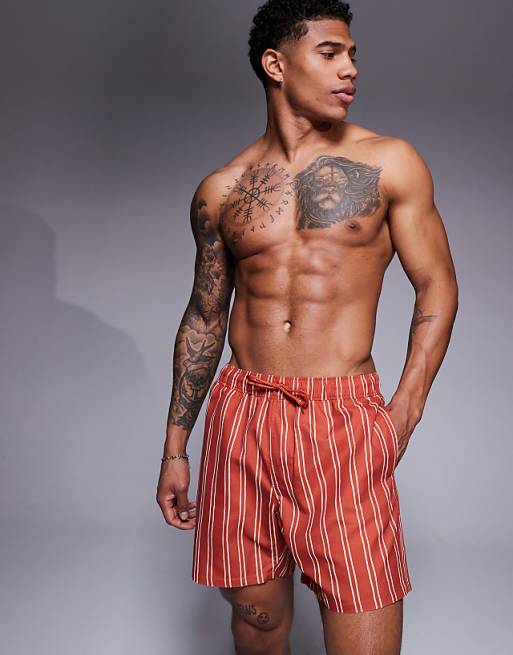 DESIGN swim short in mid length in orange stripe