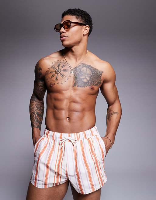 DESIGN swim short in super short length in white and orange stripe