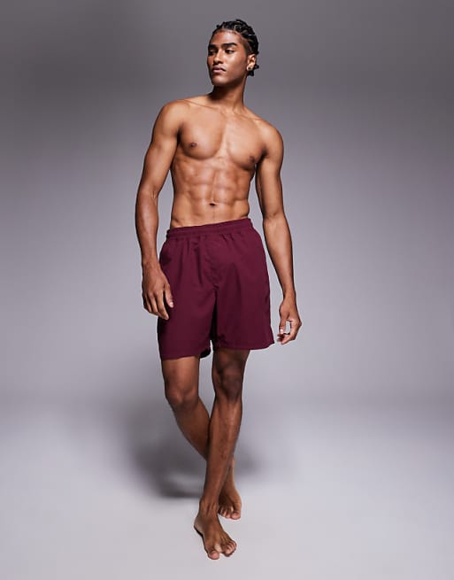 DESIGN swim shorts in long length in burgundy