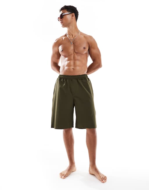 DESIGN swim shorts in long length in green