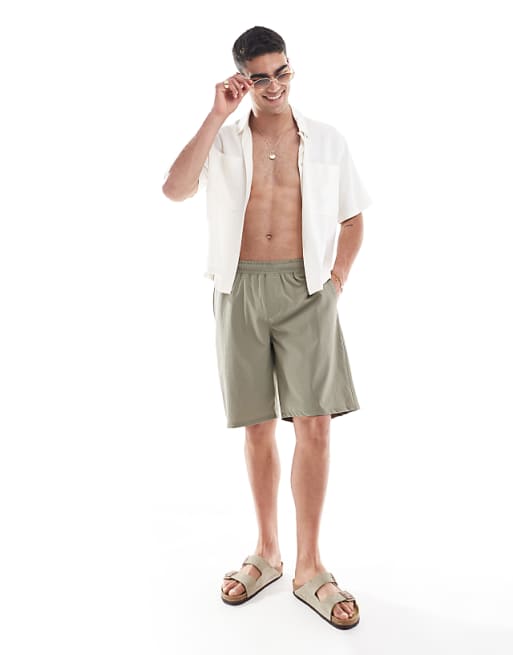 DESIGN swim shorts in long length in sage green