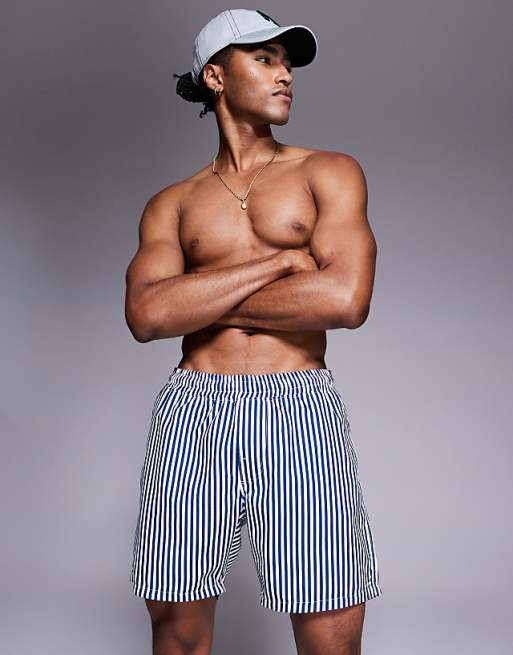 DESIGN swim shorts in mid length in navy stripe