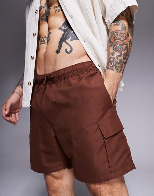 DESIGN swim shorts in mid length with cargo pockets in dark brown