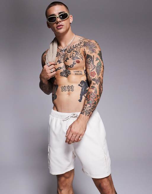 DESIGN swim shorts in mid length with cargo pockets in neutral