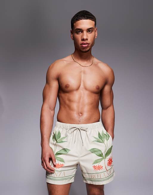 DESIGN swim shorts in mid length with placement print in beige