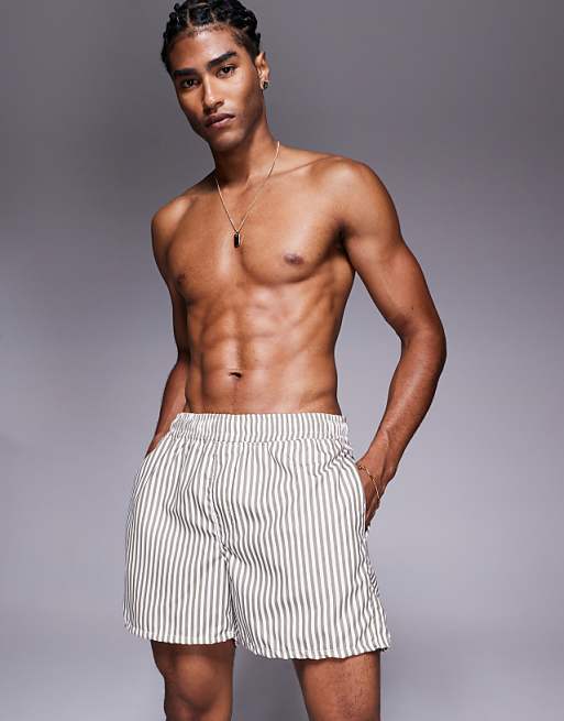 DESIGN swim shorts in short length in beige stripe
