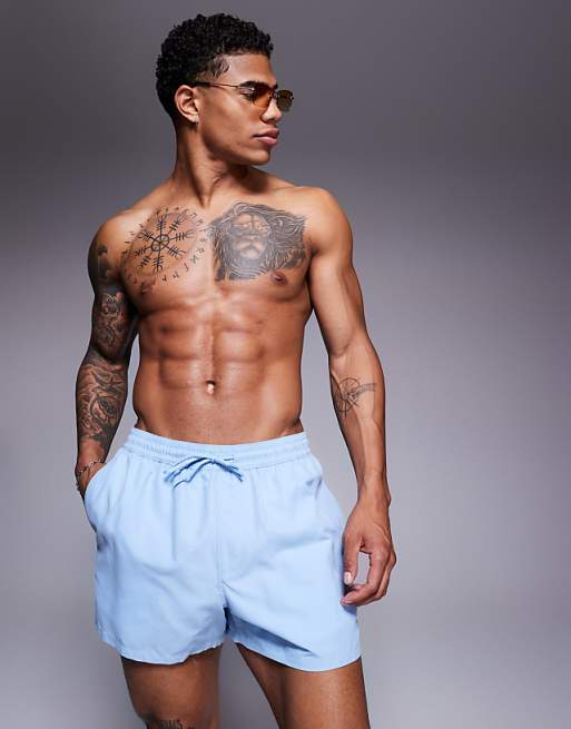 DESIGN swim shorts in short length in blue