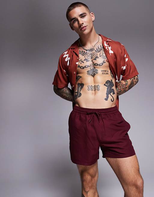 DESIGN swim shorts in short length in burgundy