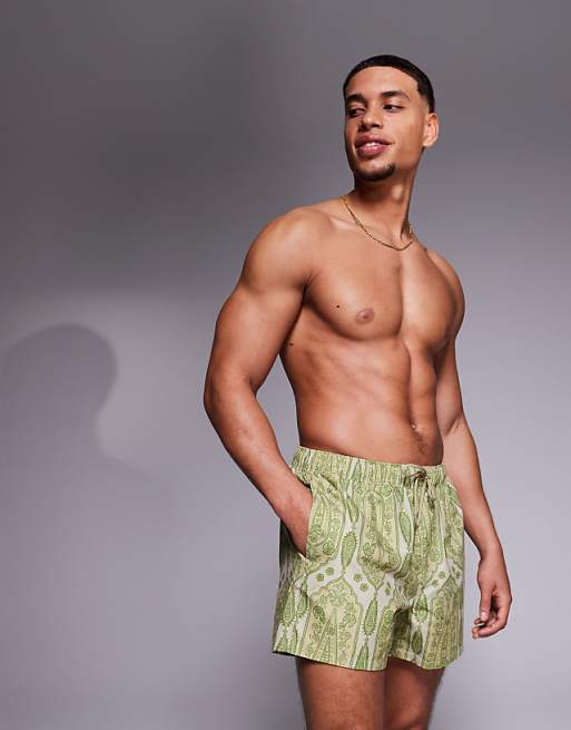 DESIGN swim shorts in short length in green paisley print