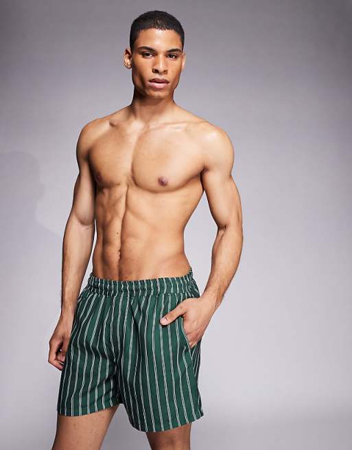 DESIGN swim shorts in short length in green stripe
