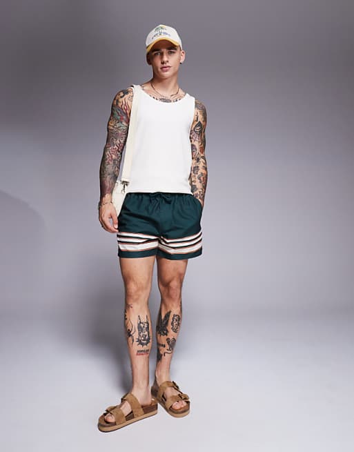 DESIGN Swim Shorts In Short Length In Green With Border Stripe