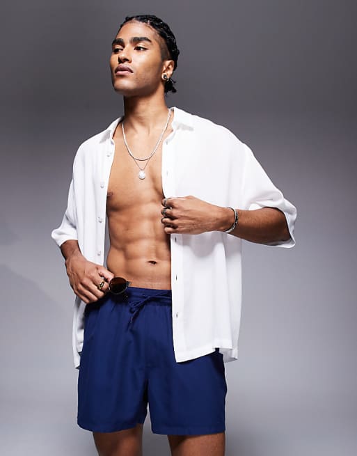 DESIGN swim shorts in short length in navy