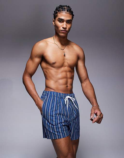 DESIGN swim shorts in short length with blue stripe