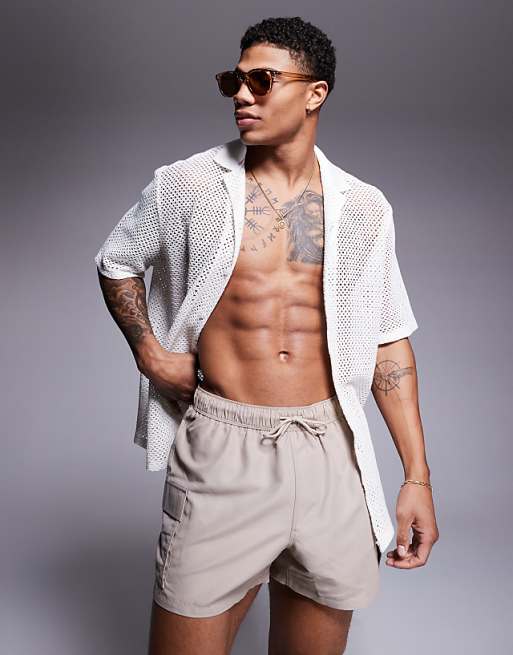 DESIGN swim shorts in short length with cargo pockets in stone