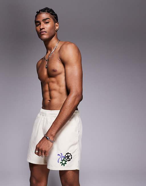 DESIGN swim shorts in short length with embroidery in neutral