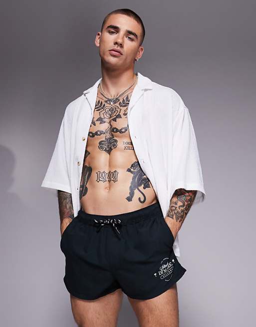 DESIGN swim shorts in super short length in black and white print