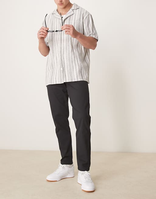 DESIGN tapered chinos in black
