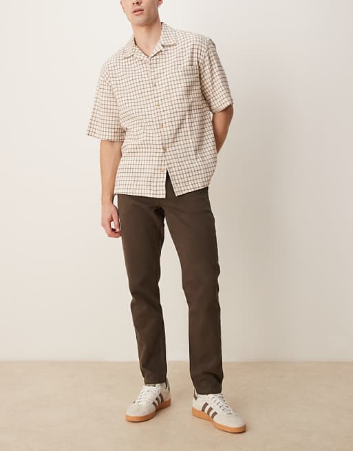 DESIGN tapered fit chinos in brown
