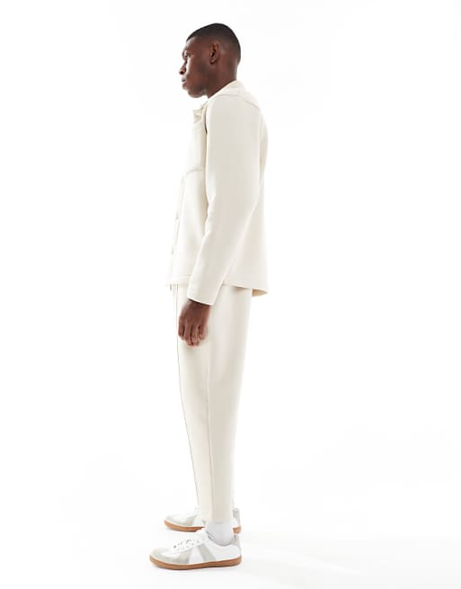 DESIGN Tapered Fit Fixed Hem Joggers With Pleats In Stone