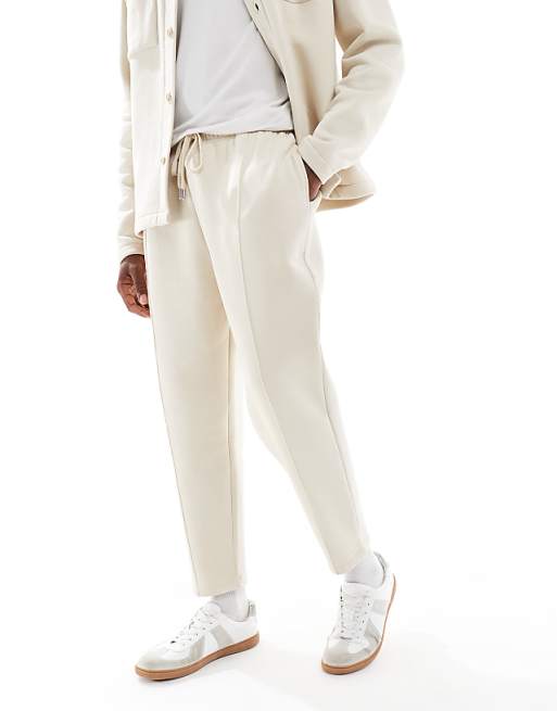 DESIGN Tapered Fit Fixed Hem Joggers With Pleats In Stone