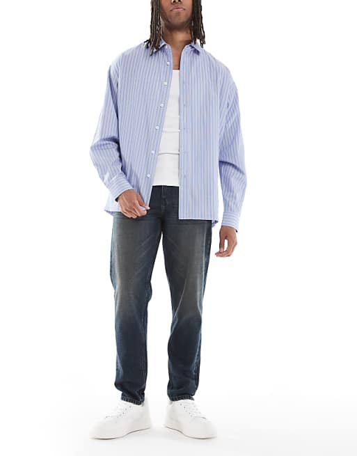 DESIGN tapered fit jeans in dark wash blue