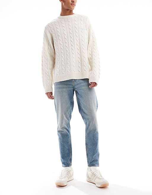 DESIGN tapered fit jeans in light wash blue