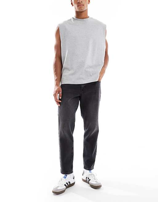 DESIGN tapered fit jeans in washed black