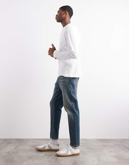 DESIGN Tapered Fit Jeans With Tint In Mid Wash Blue