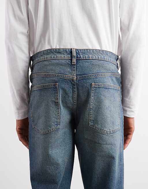 DESIGN Tapered Fit Jeans With Tint In Mid Wash Blue
