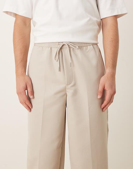 DESIGN Tapered Fit Smart Trousers With Elasticated Waistband In Stone
