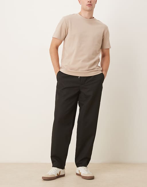 DESIGN Tapered Fit Smart Trousers With Elasticated Waistband In Black